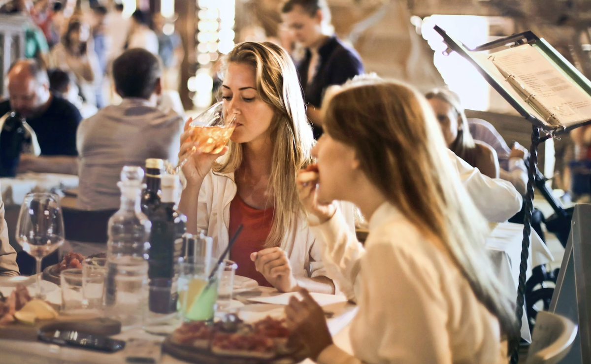 Women eating out at restaurant. Image: Pexels - Andrea Piacquadio