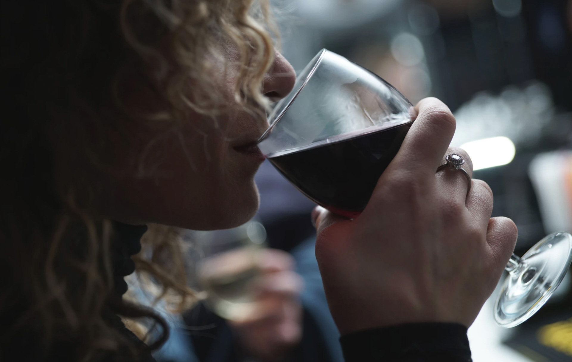 Woman drinking a glass of wine 