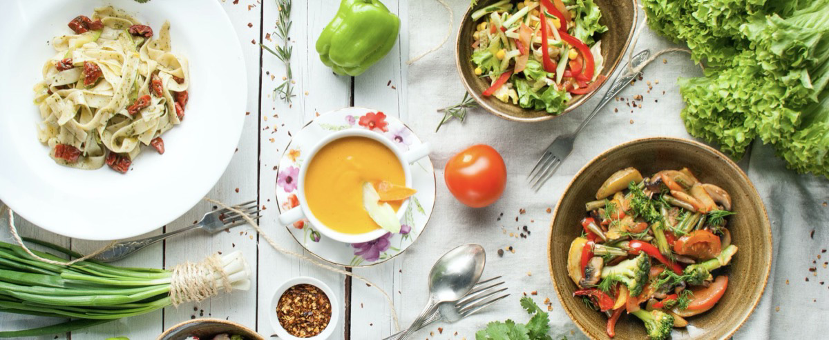 A table of healthy plated foods. Unsplash - Victoria Shes