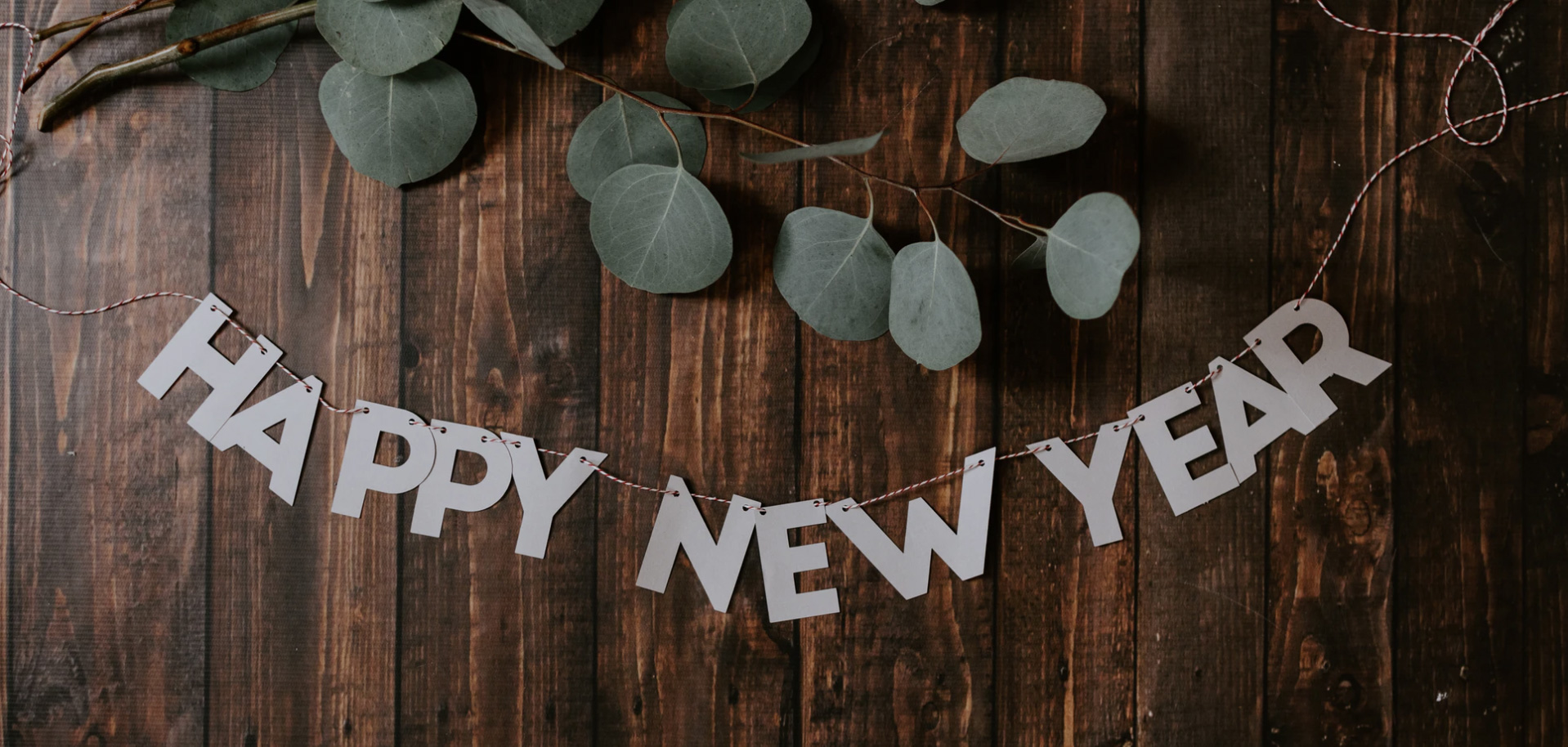 Happy new year sign on a wooden floor